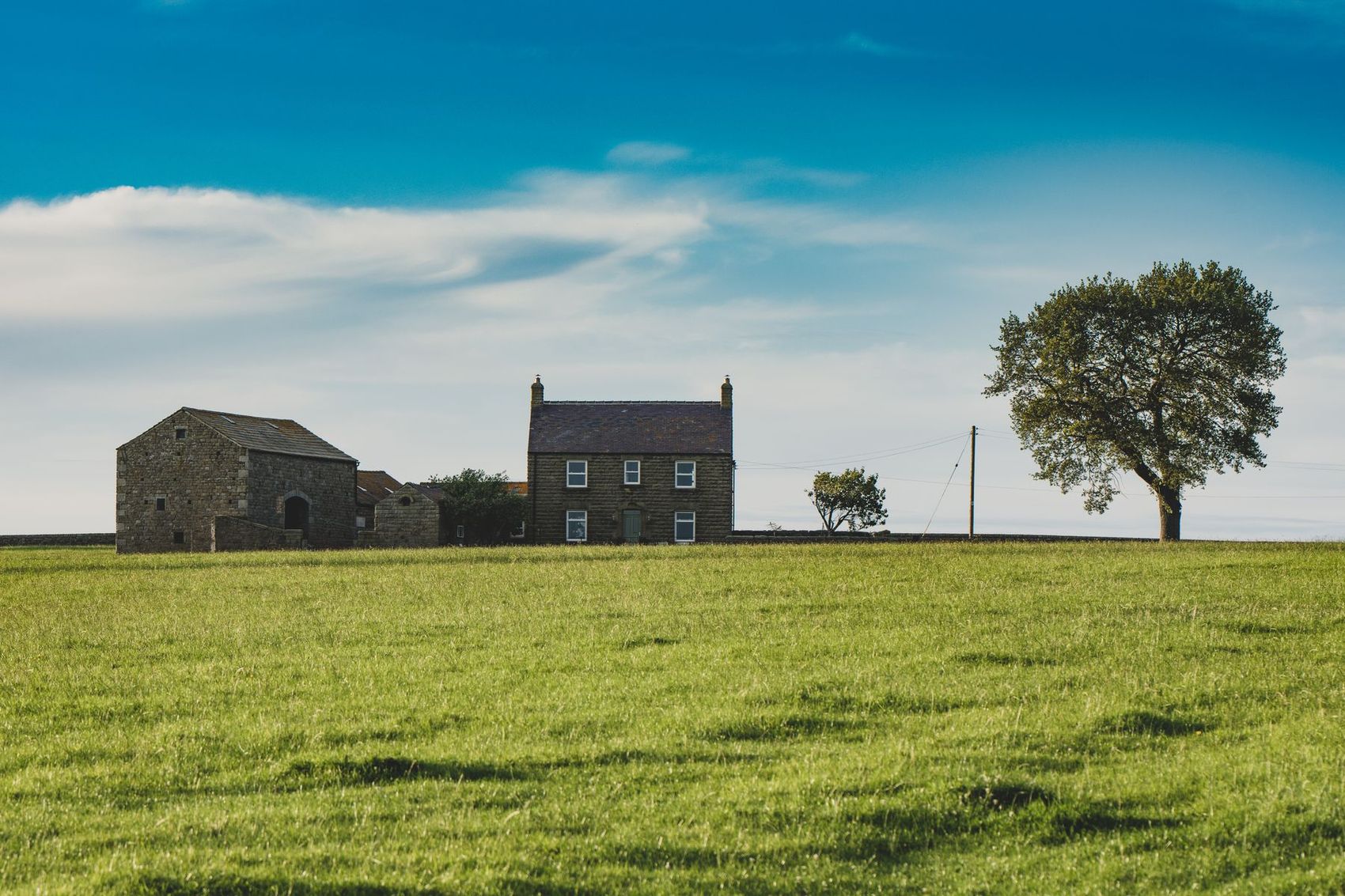 A Yorkshire stone farmhouse in open fields